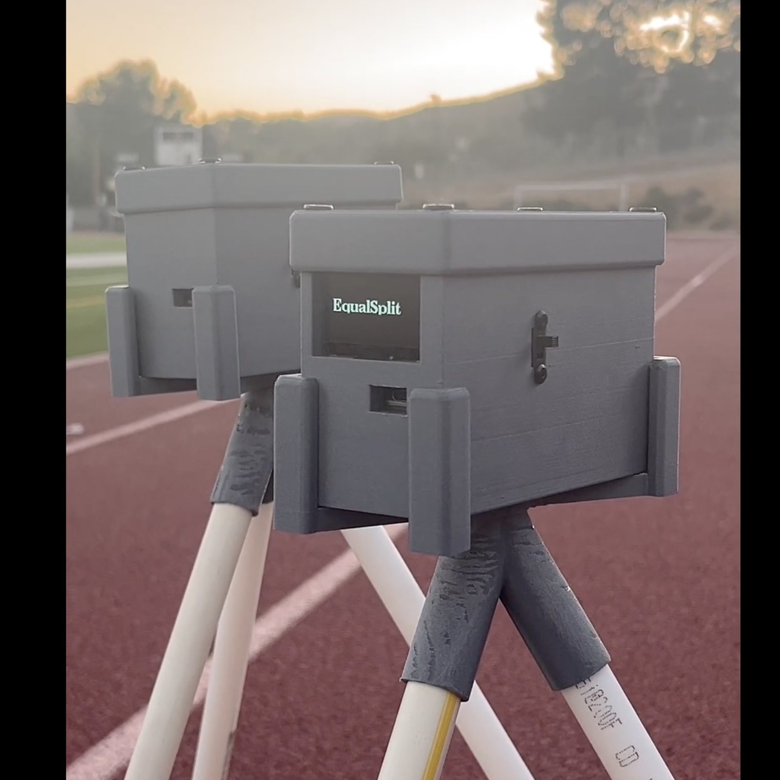 Two EqualSplit timing gates set up on the track at sunset